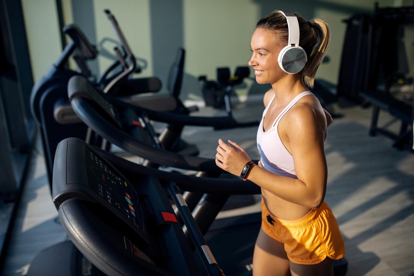 Woman running on a treadmill in Sydney gym